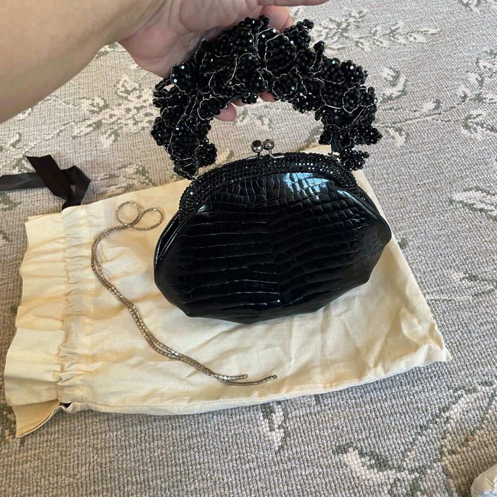 VINTAGE Black Crocodile Judith Liber bag with black diamond frame .